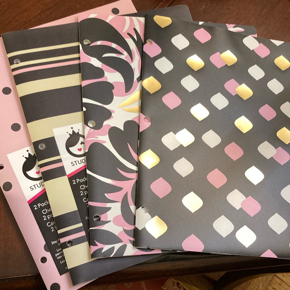 Set of four Studio-C two-pocket poly folders.